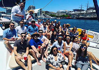 Rakuten Marketing Sydney and Melbourne team pictured on a boat in Sydney Harbour