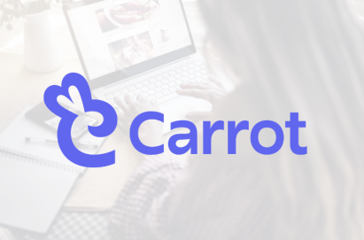 Carrot Logo overlaid on image of woman with long blonde hair working on a laptop computer.